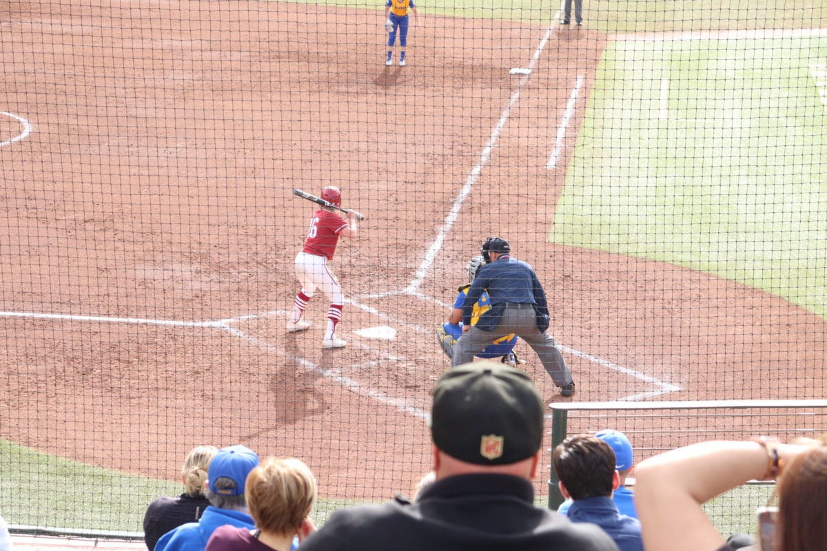 Chloe Doyle waits for the pitch at home plate.