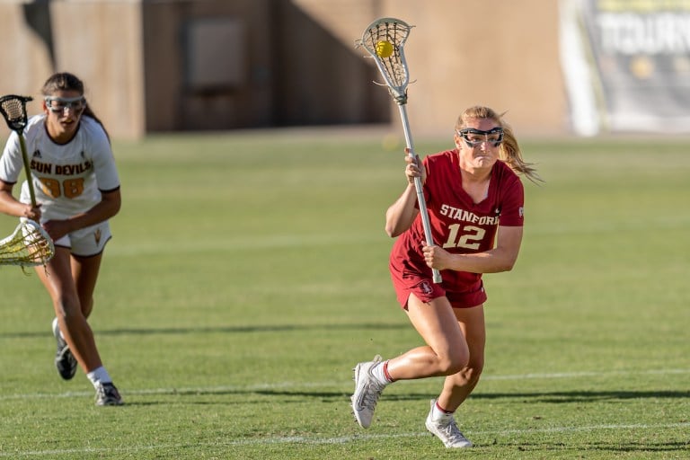 Sophomore midfielder Ailish Kelly runs down the field.