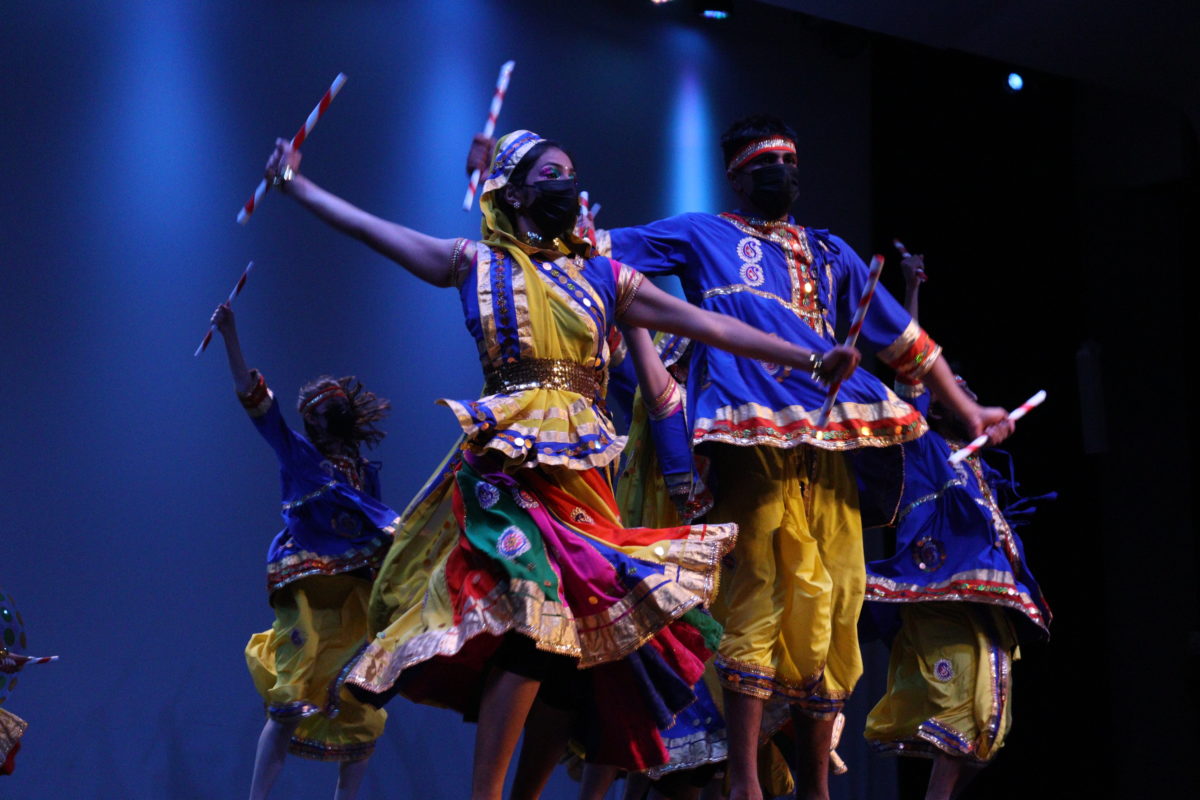 Basmati Raas dancers with garba sticks.