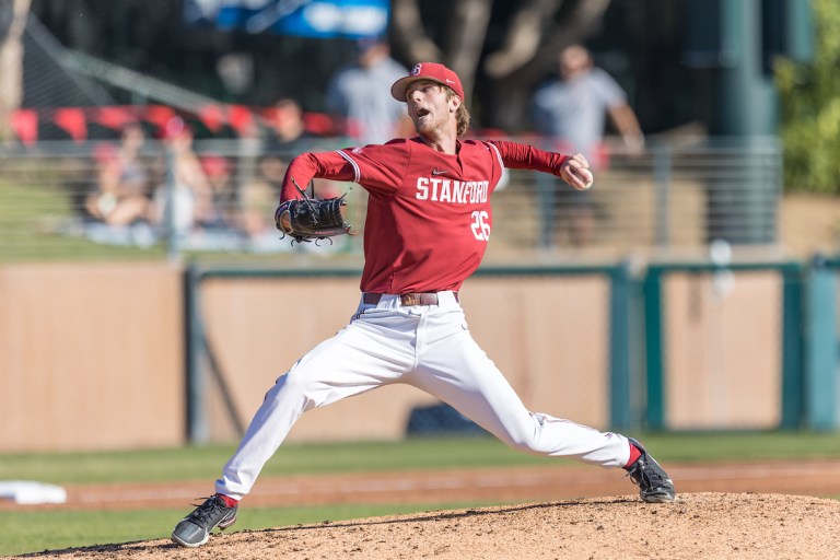 Junior pitcher Quinn Matthews winds up to throw.