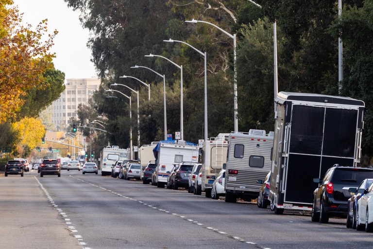 RVs line the curb of El Camino, a street just outside Stanford's campus.