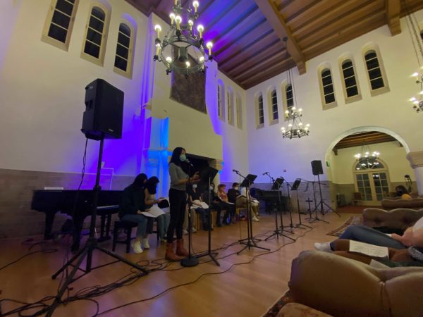 Fourth year Ph.D. student Elaine Lai introduces "White Boy" to the audience at Toyon Hall. (Photo: CHLOE CHOW/The Stanford Daily)