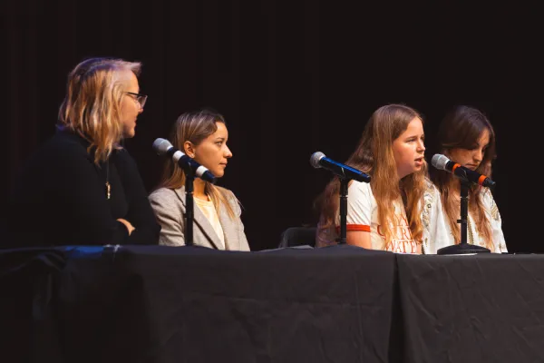 Anastasiia Malenko '23, Kate Slunkova MBA ’22 and Catarina Buchatskiy ’23 speak during a SIG panel moderated by Professor Yulia Illchuk