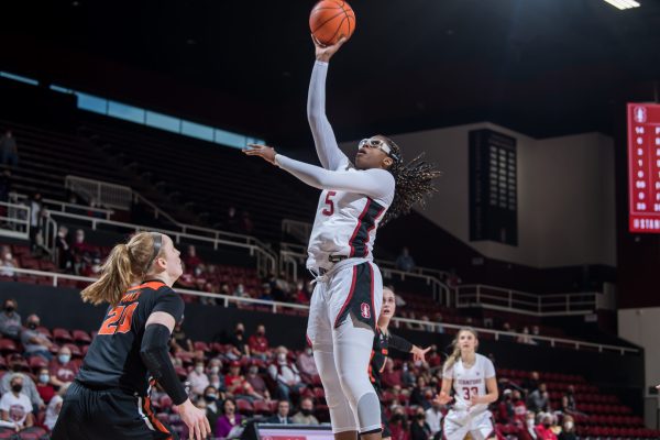 Junior forward Francesca Belibi shoots a layup.