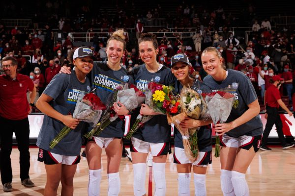 Five seniors, fifth years and sixth years, Jordan Hamilton, Lexie Hull, Lacie Hull, Alyssa Jerome and Anna Wilson pose for a photo on Senior Night.