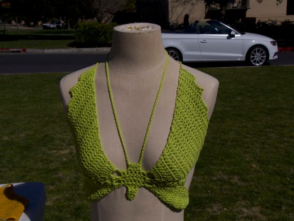 A green crop top displayed.