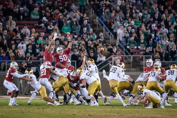 DE Thomas Booker '22 and DT Dalyn Wade-Perry '21 attempt to block a field goal.