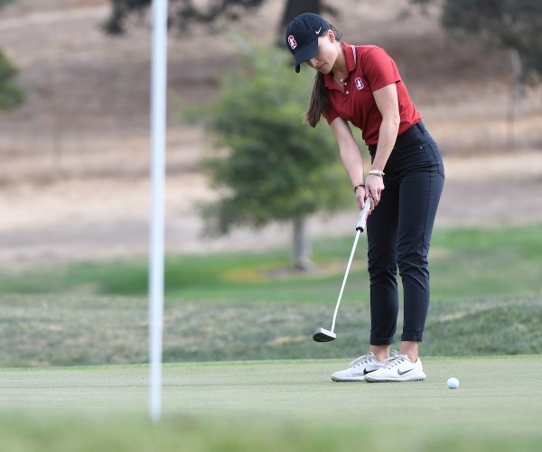 Senior Aline Krauter putts.