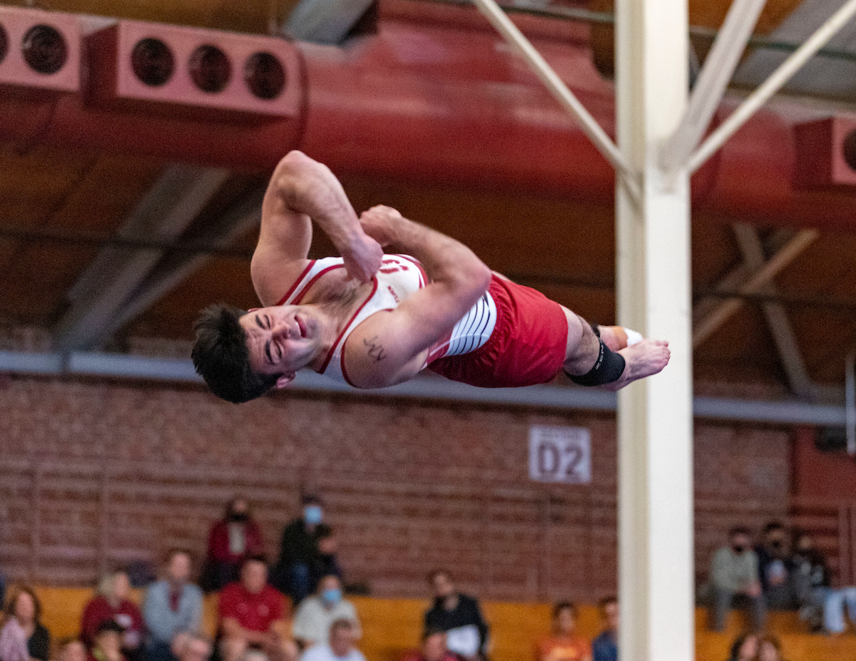 Senior Bryan Perla twists in the air.