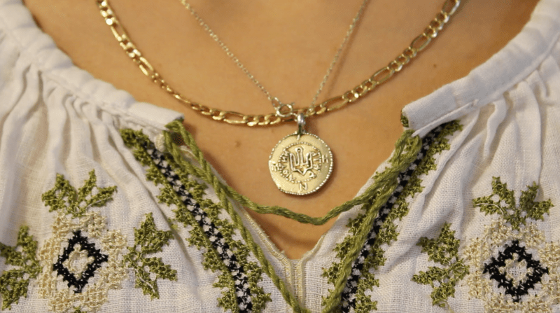 Cat’s embroidered shirt is a vyshyvanka, a piece of traditional Ukrainian clothing. She says she wears it, in part, as an act of defiance: Cat’s grandmother was banned from wearing one under Soviet Rule.