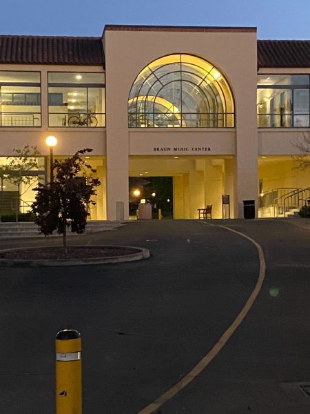 A photo of Braun Music Center lit up at night