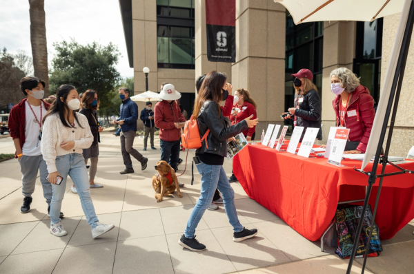 Stanford admits walking up to an information table outside the Stanford alumni center