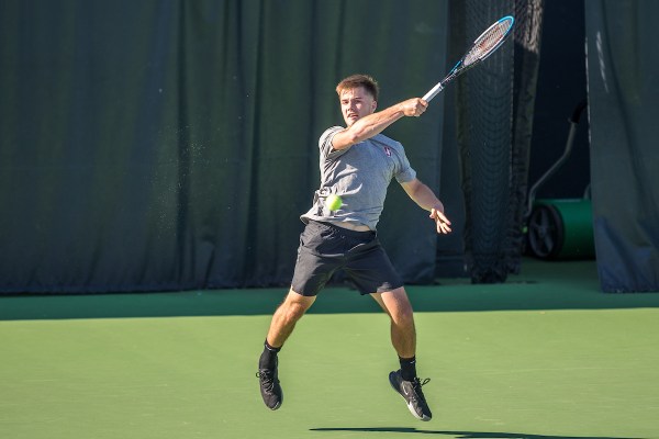 Sophomore Arthur Fery hits a forehand