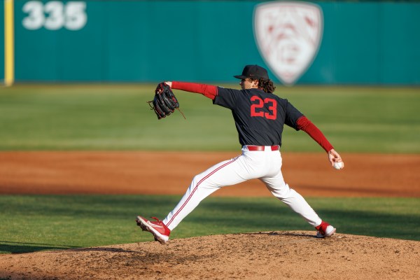 Joey Dixon in mid-throw on the pitching mound.