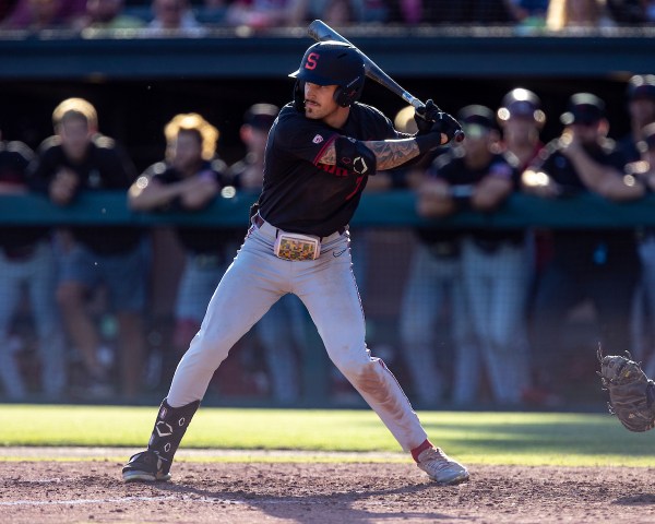 Junior right fielder Brock Jones hits