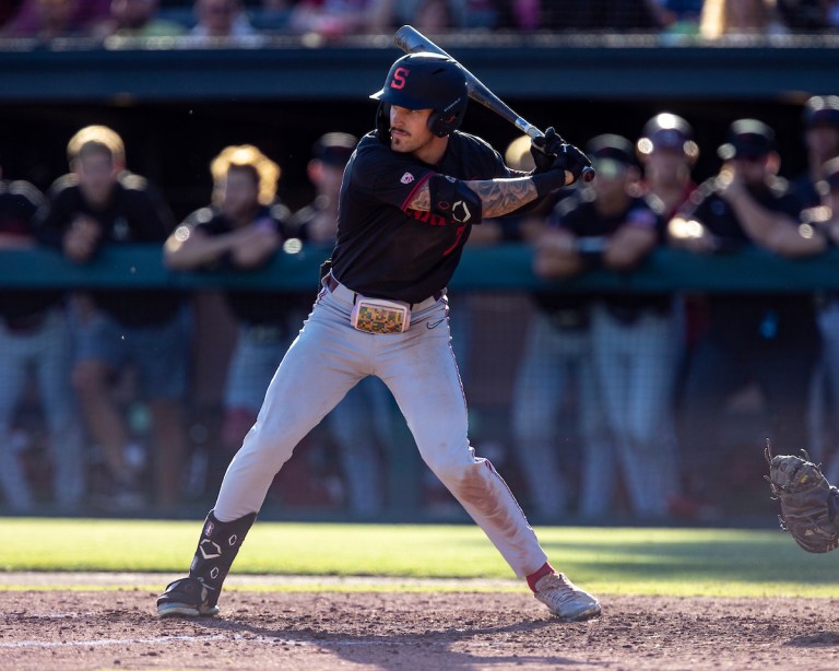 Junior right fielder Brock Jones hits