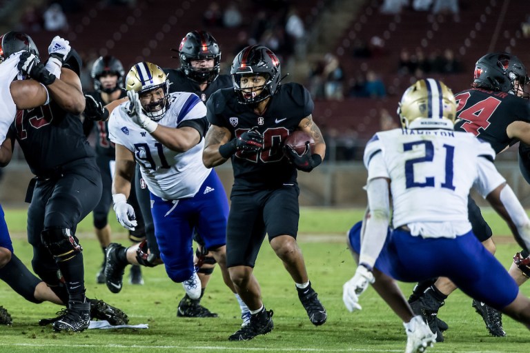 austin jones runs through the defense