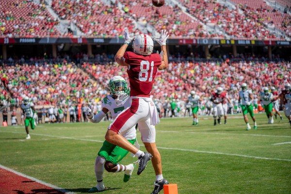 Brycen Tremayne tries catching a fade route near the front pile on against Oregon