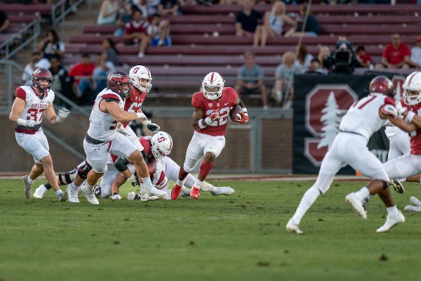 E.J Smith (22) runs the ball against Colgate