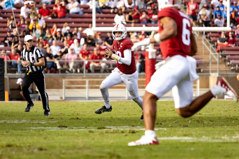 football quarterback looks to throw the ball