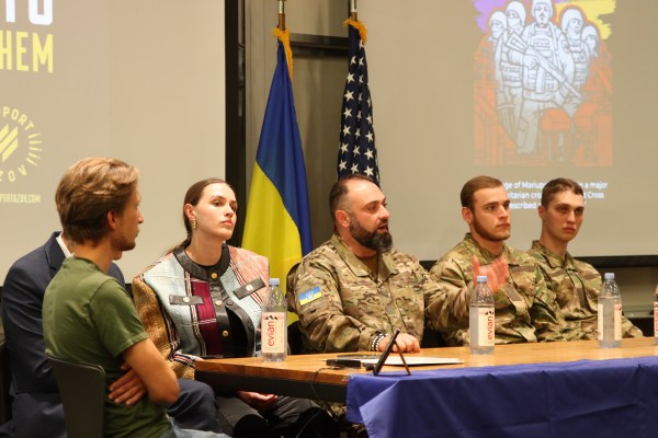 From left to right: Yulia Fedosiuk, George Kuparashvili, Artur Lypka and Vladyslav Zhaivoroniuk speak at the Friday event.