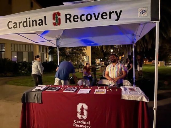 A photo of the Cardinal Recovery group at a tent on The Row