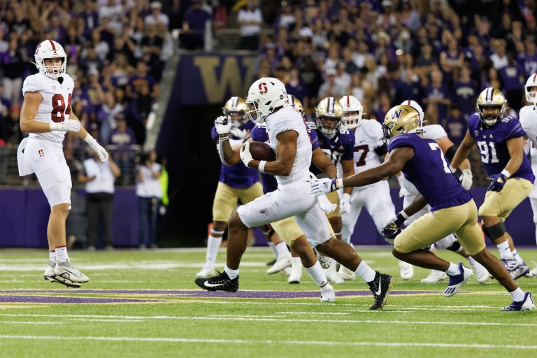 Elijah Higgins catches a ball against Washington