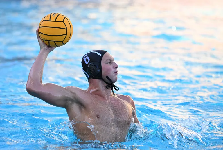 Ethan Parish prepares to shoot the ball in the pool