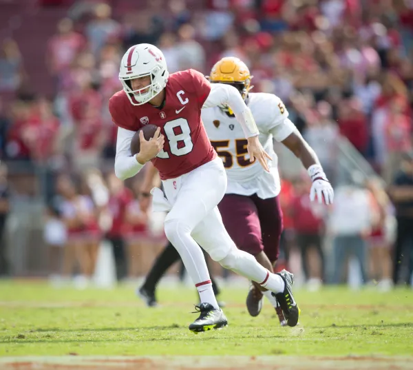 Tanner McKee runs with the ball