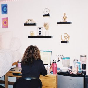 Megan works at her desk.