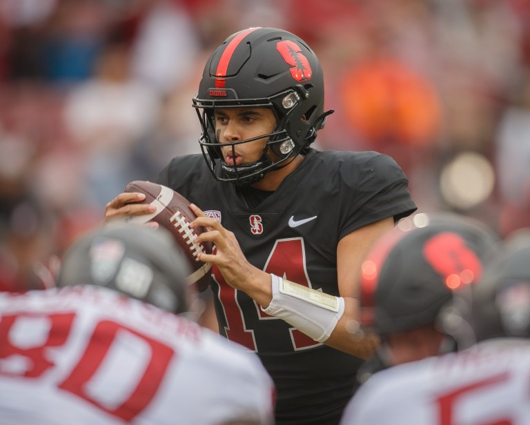 Ashton Daniels holds a football