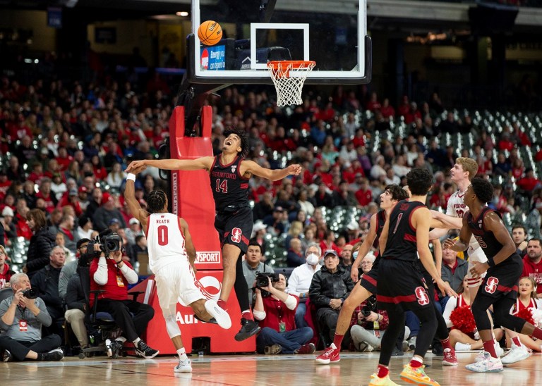 Senior Spencer Jones attempts to block a shot