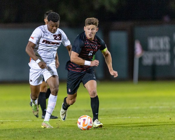 Senior infielder Cam Cilley dribbles the ball