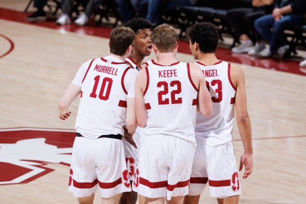 Members of the Stanford men's basketball team during a game against Colorado on Feb. 19, 2022. The Cardinal kick off their season next Monday versus Pacific. (Photo: BOB DREBIN/ISI Photos)