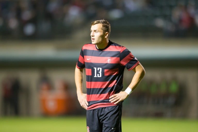 Jordan Morris stands hands on hips