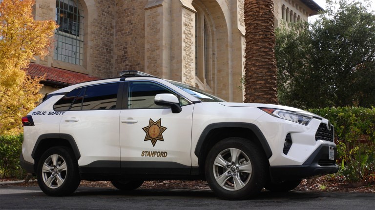 An SUDPS car parked in front of Memorial Church.