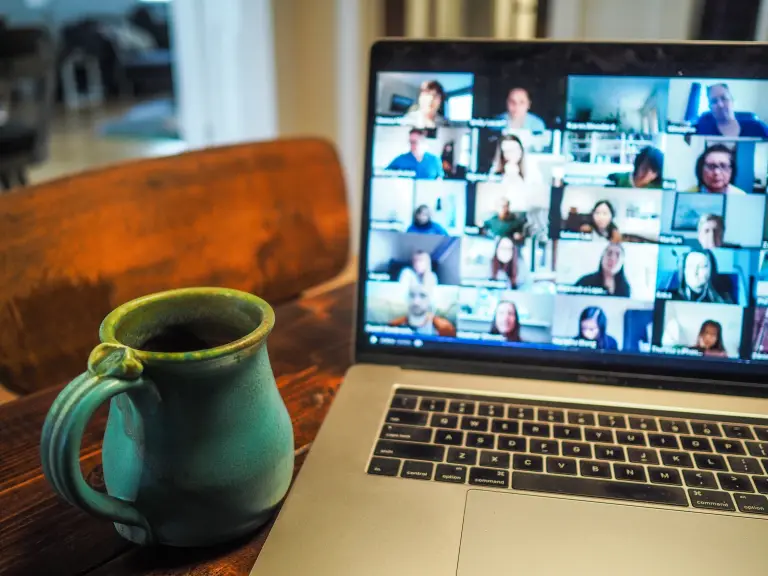 A computer features a variety of faces on Zoom.