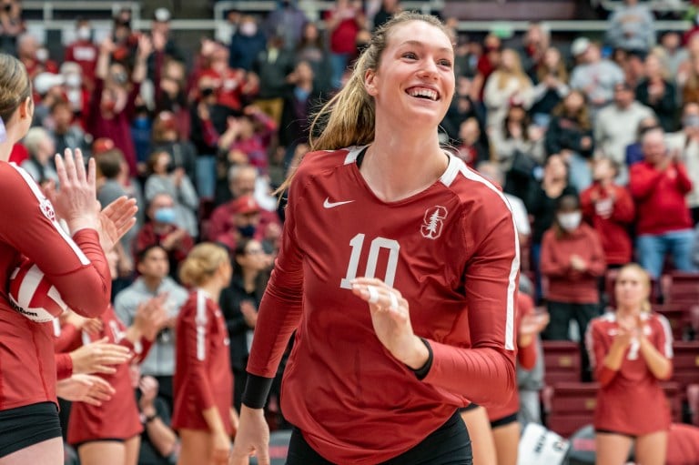 Kendall Kipp in a red jersey looking up and smiling