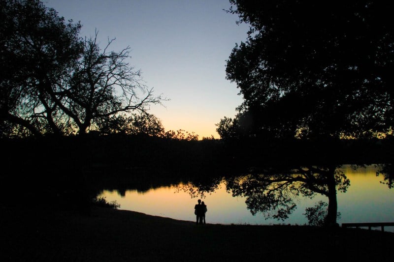 Students enjoy the sunset at Lake Lagunita. (Photo: AVNI VATS/The Stanford Daily)