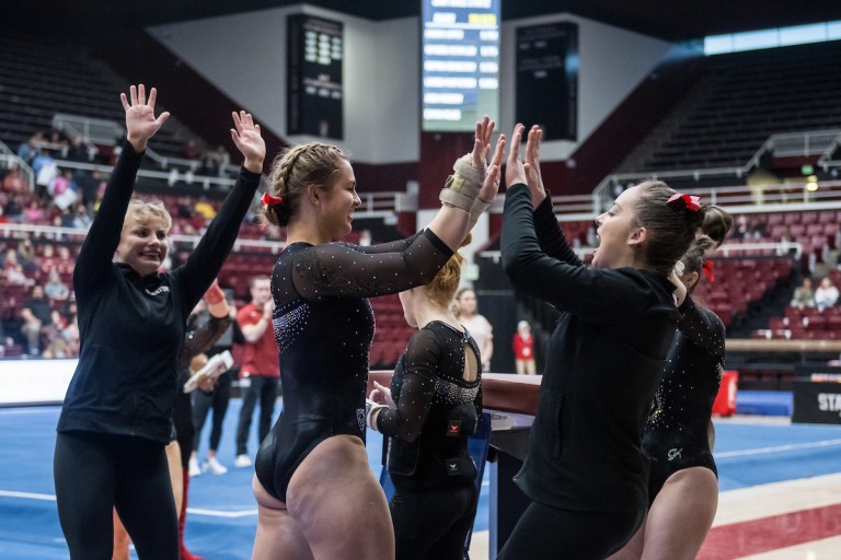 Group of women gymnasts celebrating together