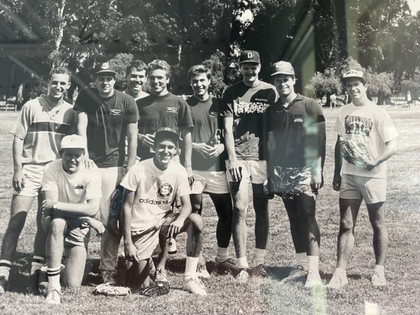 A group of men posing for a picture