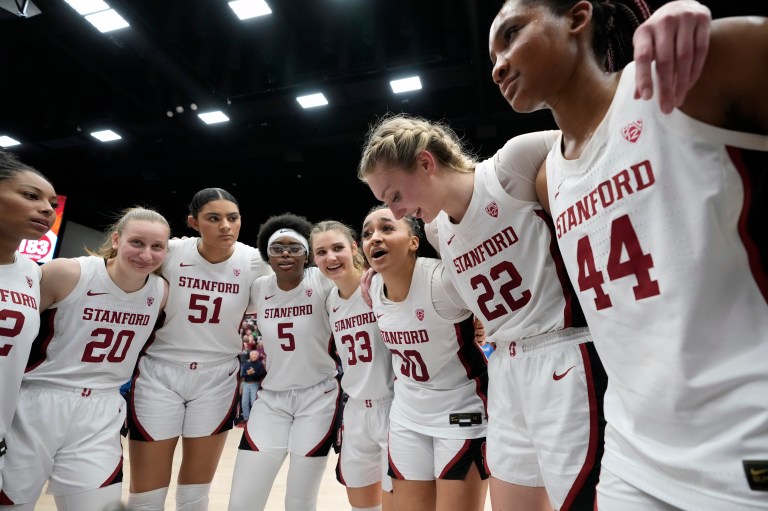 Stanford players in the huddle.