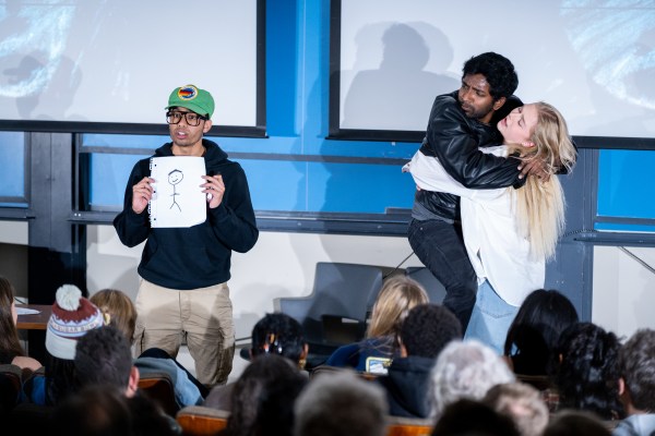 Student comedy group Robber Barons performs a skit from their tricentennial show at Geology Corner.