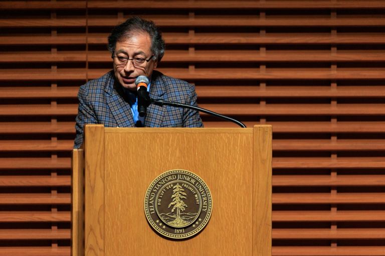 Colombian President Gustavo Petro speaks at a podium in CEMEX auditorium.