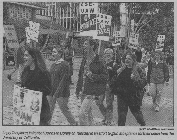 TAs at UC Berkeley protesting, holding signs.