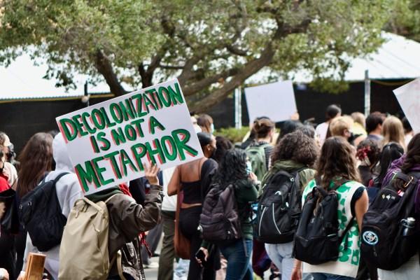 Hundreds of students proceed from Memorial Church to White Plaza in protest as a part of the Palestinian Walkout organized by SJP. (Photo: ABHIRAJ GUPTA/The Stanford Daily)