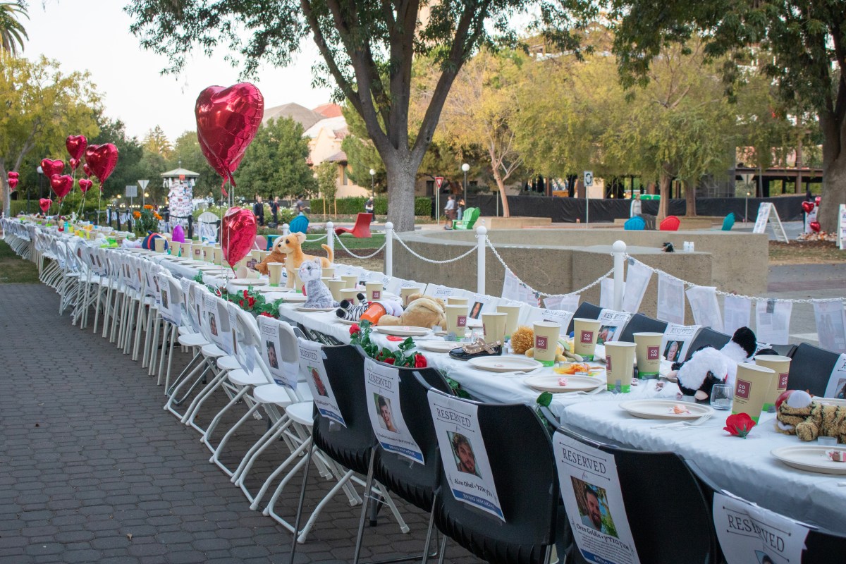 Empty Shabbat table honors hostages in front of Old Union