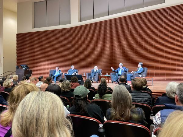 John Kerry, Reid Hoffman, Laurene Powell Jobs and David Simas sit in Cemex auditorium.