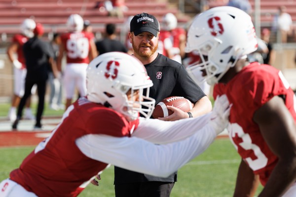 Stanford players warmup on field against each other