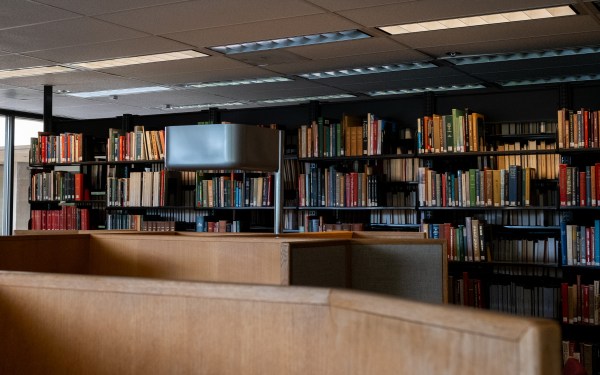 Books line the shelves inside Green Library.